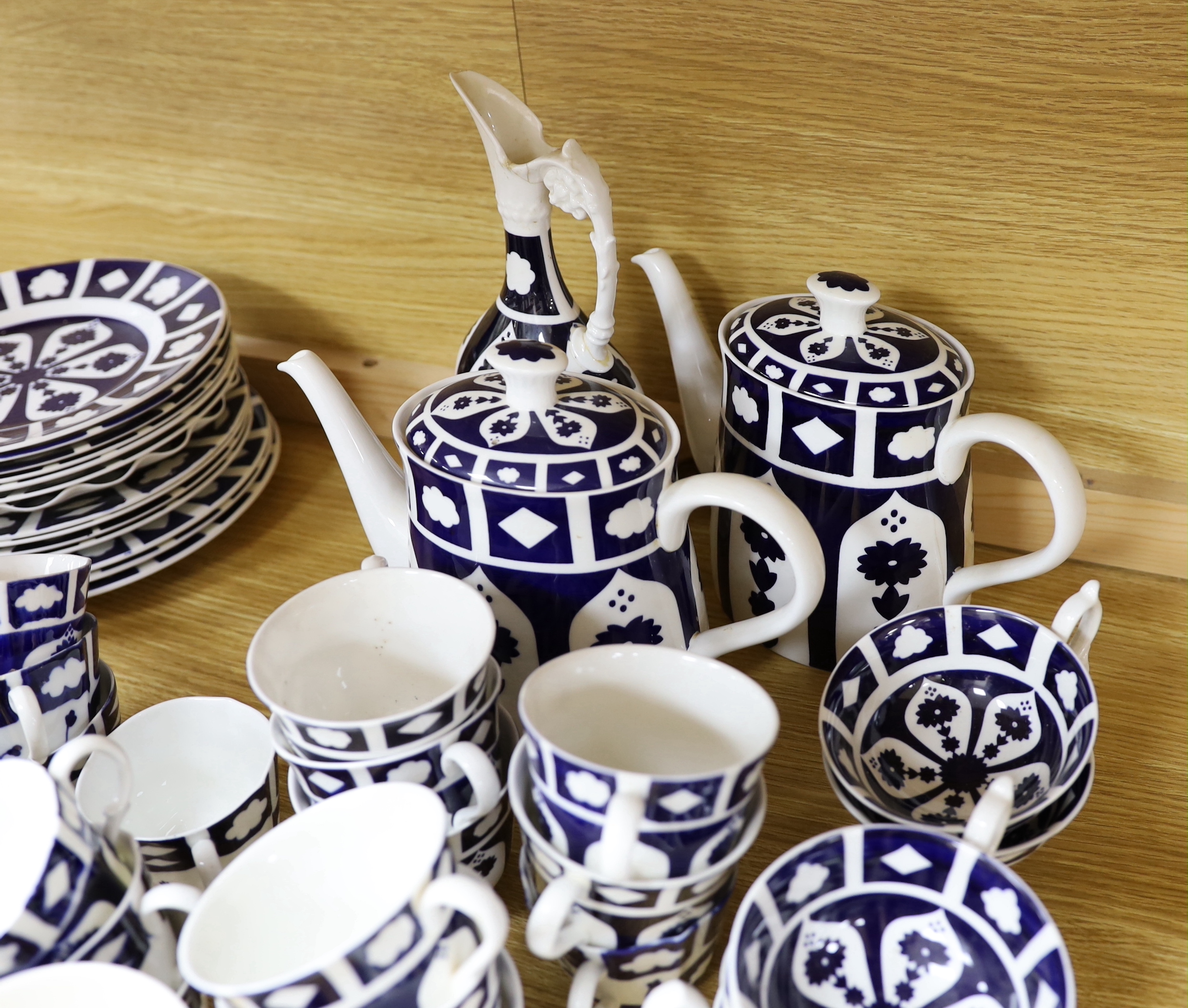 Unfinished Royal Crown Derby bone china dinner service and tea ware, comprising teapots, cups, saucers, dinner plates, side plates, coffee cans, etc.